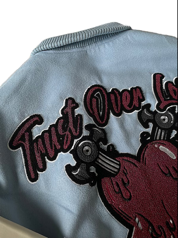 TRUST OVER LOVE VARSITY JACKET - Vintage Blue